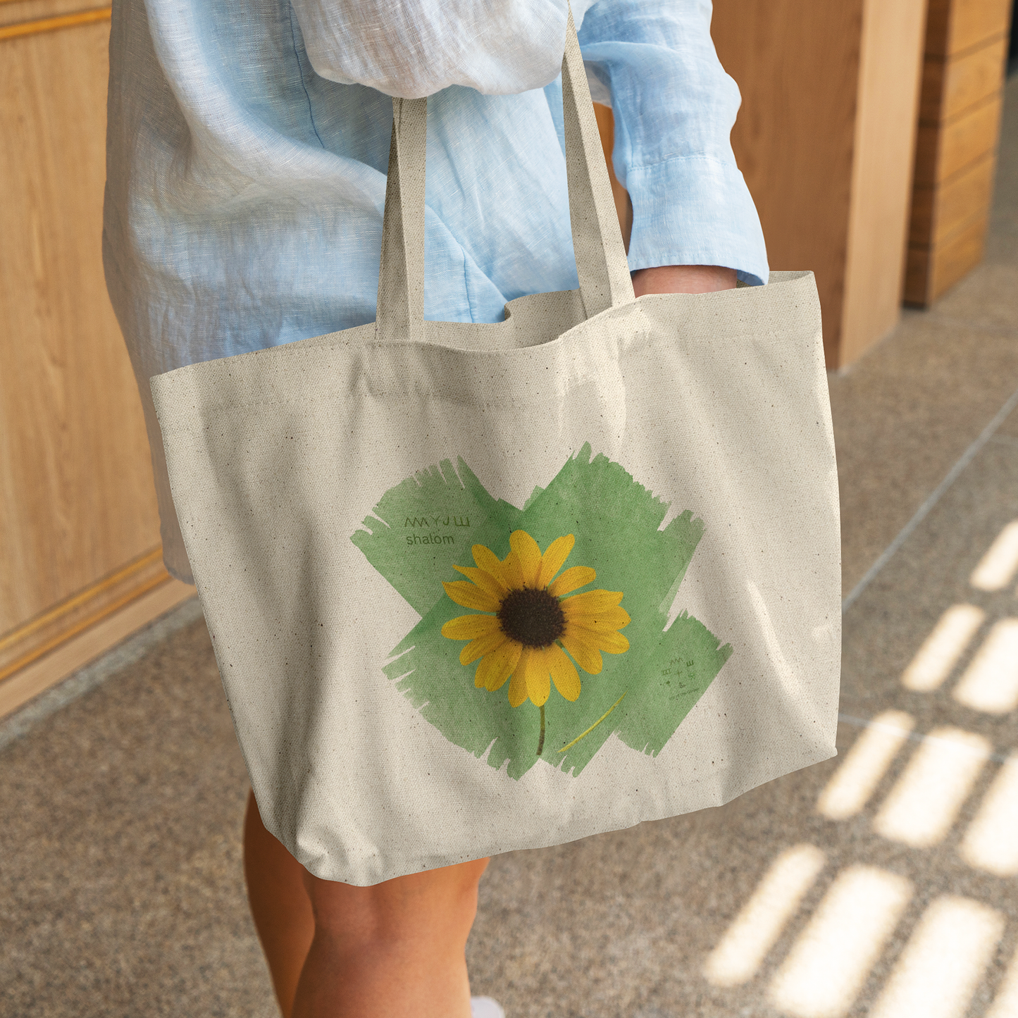 Shalom_Sunflower_Tote_CottonTote_L_WomanDigging_Mockup.png_15650035