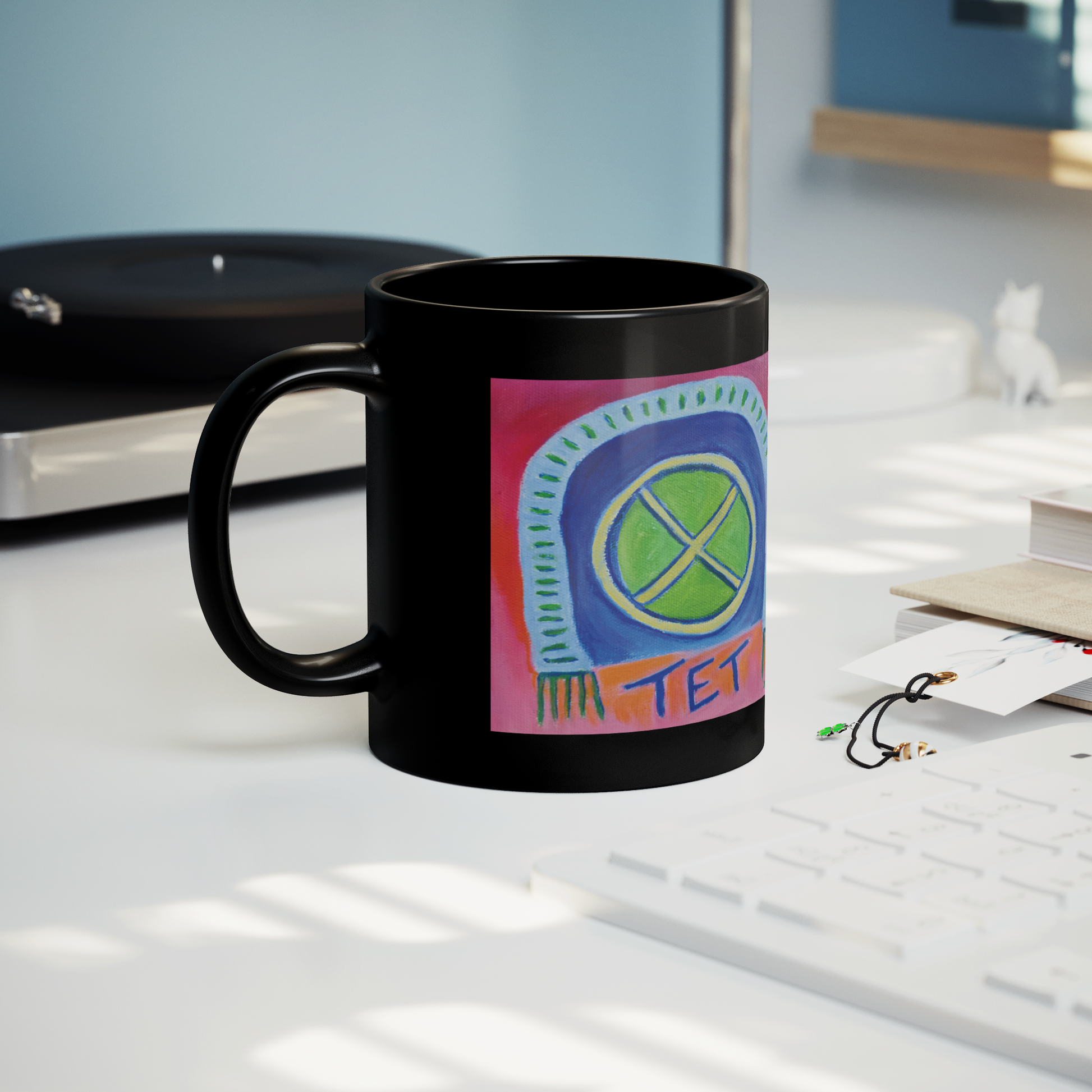 TET_Glossy_Black_Mug__Whats_in__Lifestyle_Record_Player_Mockup.png