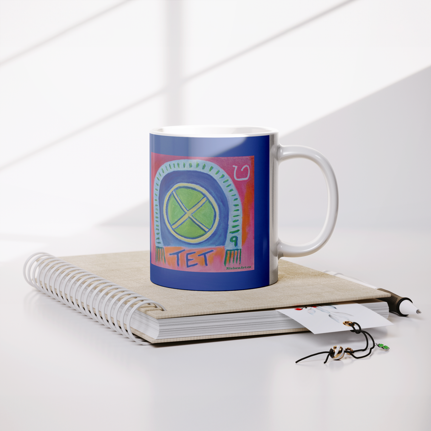 TET_White_Mug__Whats_in_Your_Ba_Lifestyle_Notebook_Mockup.png