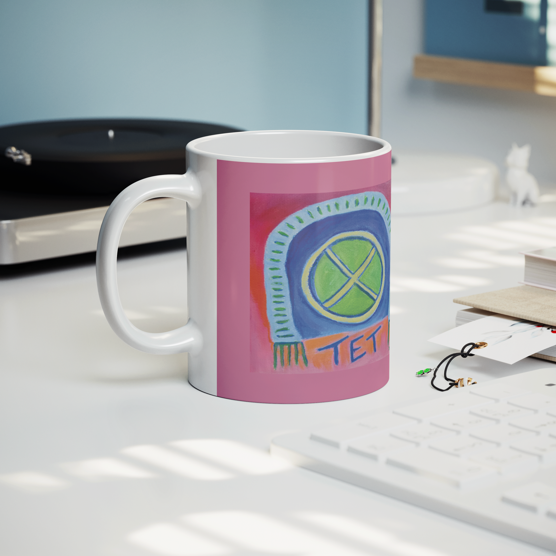 TET_White_Mug_with_Pink_Background___Lifestyle_Record_Player_Mockup.png